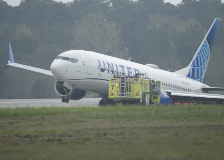 United Airlines plane rolls off runway in Houston