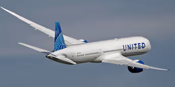 United plane turns back 3 hours into flight after a ‘disruptive’ passenger sat in a crew seat and got in a shouting match with a flight attendant, report says